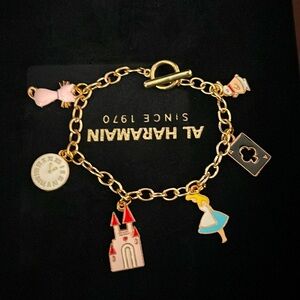 Charm bracelets 
Alice and wonderland theme